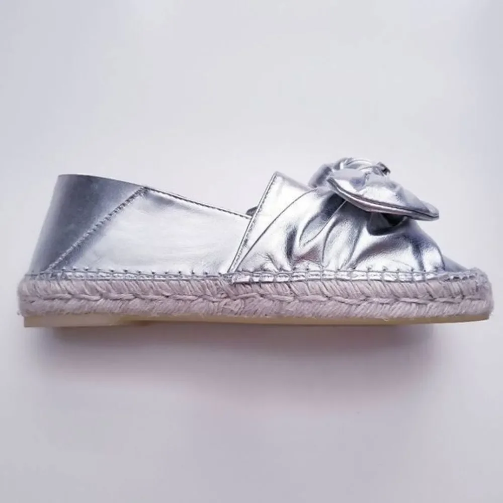 Anthropologie ras metallic
